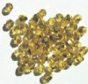 50 6mm Faceted Half Mirror Coated Yellow Beads